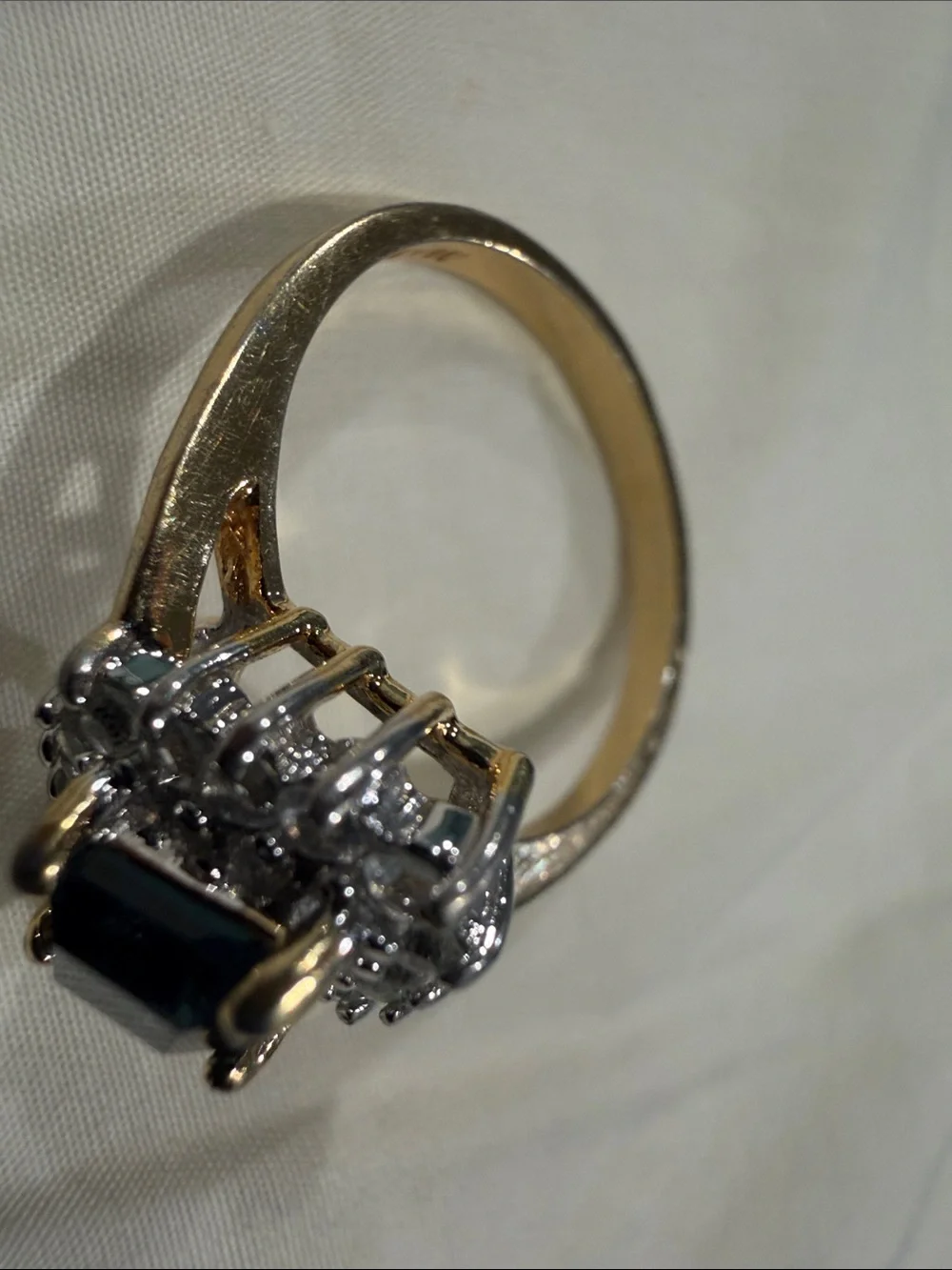 18K Gold Electroplated Ring with Deep Blue Kite-Cut Center and Clear Stones.